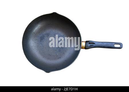 old black pan There are yellow stains on the handle. isolated on a white background Stock Photo