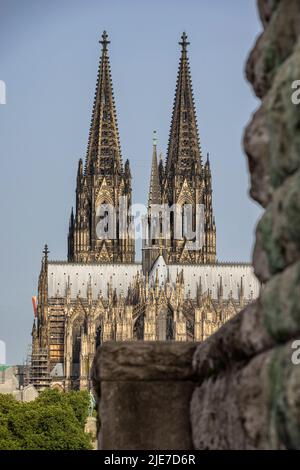 Cologne Cathedral majestically rising above city skyline Stock Photo ...