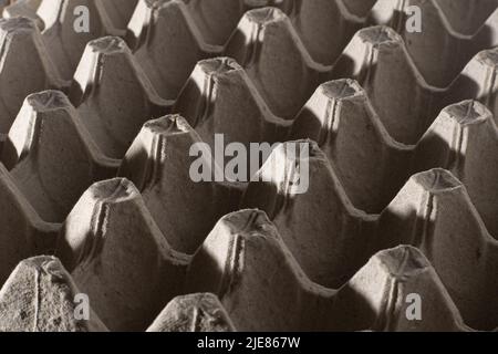 Abstract background. frame geometry. Egg packaging. Paper tray for domestic eggs. Beige and grey. Minimalism. Paper packaging egg carton Stock Photo