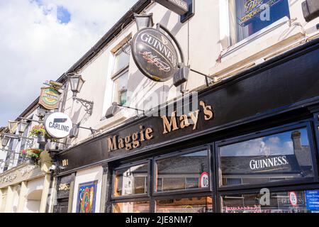 Signs for Guinness, Carling and Bulmers outside an Irish pub. Stock Photo