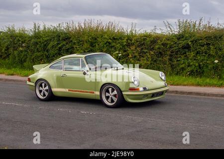 1995 90s nineties Green Porsche 911 Carrera 4 3600cc petrol coupe; en-route to Hoghton Tower for the Supercar Summer Showtime car meet which is organised by Great British Motor Shows in Preston, UK Stock Photo