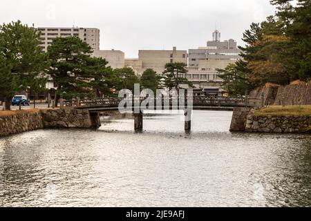 Matsue, Shimane, JAPAN - Dec 1 2021 : Kitasomon Bridge (Kitasomonhashi) at the Matsue Castle at evening. Stock Photo