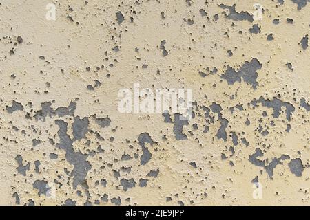 Grungy rough textured wall. Peeled structure. Abstract background Stock Photo