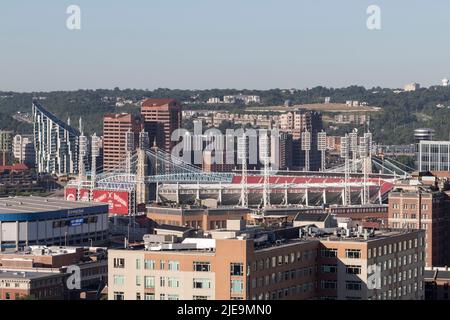 Cincinnati - Circa June 2022: Cincinnati Riverfront district including the Great American Ball Park, Roebling Bridge and Covington, Kentucky. Stock Photo