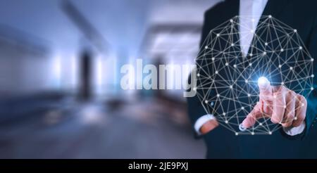 Businessman pressing button on hologram virtual screens with hexagons and transparent. Business technology internet and virtual reality concept. With Stock Photo