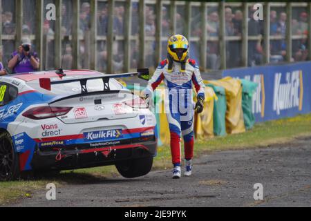 Croft, England, 26 Jun 2022. James Garnall after crashing a Hyundai during the second race in the Kwik Fit British Touring Car Championship. Credit: Colin Edwards/Alamy Live News Stock Photo