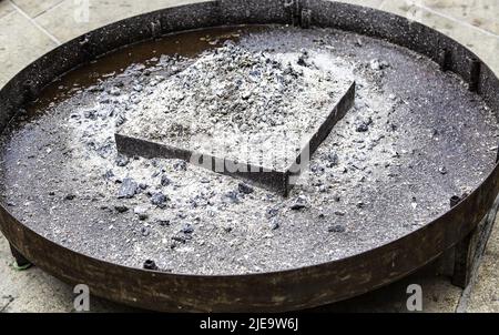 Detail of extinguished ashes in a barbecue Stock Photo