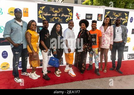 Pasadena, USA. 25th June, 2022. Designers attend Restored Reflections Inc. 2nd Annual Fashion With A Purpose Fashion Show at Grand Hope Park, Los Angeles, CA on June 25, 2022 Credit: Eugene Powers/Alamy Live News Stock Photo