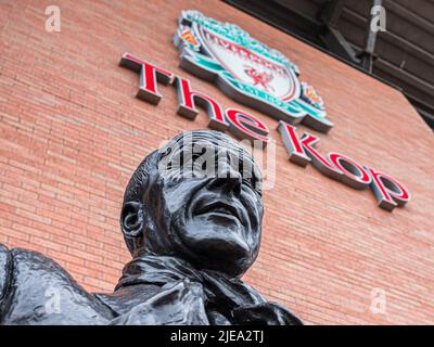 Looking up at the Bill Shankly statue outside The Kop stand at Anfield Stadium in Liverpool, seen in June 2022. Stock Photo