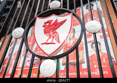 An old Liverpool Football Club badge in red and white pictured on the Paisley Gates outside Anfield stadium in Liverpool in June 2022. Stock Photo