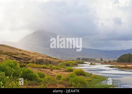 Clady river and Mount Errigal semi covered by clouds, County Donegal, Ireland Stock Photo