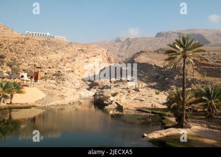 Refreshing swimming visit to Wadi Bani Khalid, Oman Stock Photo