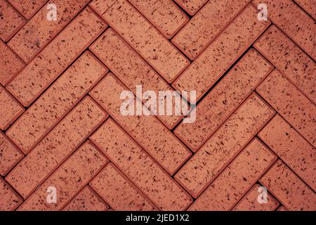 Redbrick paving stones on a sidewalk or pavement. View from above Stock Photo