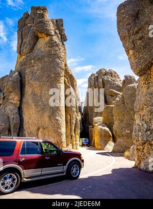 Car in Needles Eye Tunnel on the Needles Highway in Custer State Park in the Black Hills of South Dakota USA Stock Photo