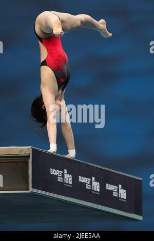 Budapest, Hungary. 26th June, 2022. Chen Yuxi of China competes during the Women's 10m Platform semifinal of Diving at the 19th FINA World Championships in Budapest, Hungary, June 26, 2022. Credit: Zheng Huansong/Xinhua/Alamy Live News Stock Photo