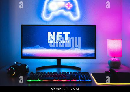 Metaverse and Blockchain Technology Concept - Gaming room displaying gamer NFT marketplace on computer screen Stock Photo