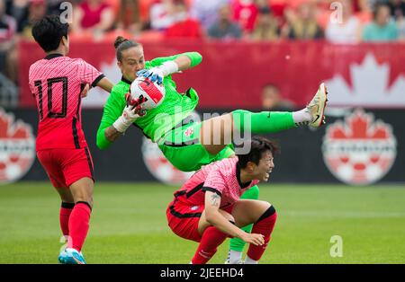 Toronto, Canada. 26th June, 2022. Goalkeeper Kailen Sheridan (C) of Canada makes a save during a football friendly match between Canada and South Korea at BMO Field in Toronto, Canada, on June 26, 2022. Credit: Zou Zheng/Xinhua/Alamy Live News Stock Photo