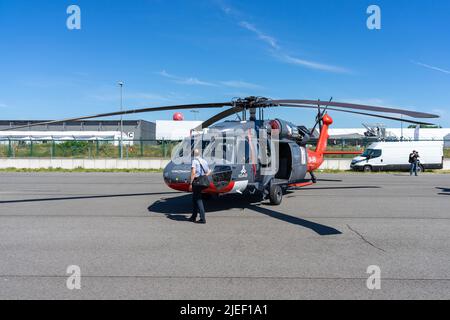 Medium-lift utility military helicopter Sikorsky UH-60A Black Hawk used by Slovak Training Academy. Exhibition ILA Berlin Air Show 2022 Stock Photo