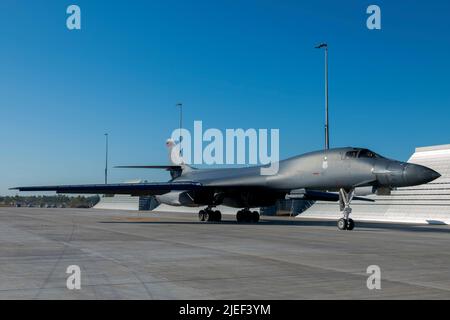 A U.S. Air Force B-1B Lancer attached to the 34th Bomb Squadron, Ellsworth, South Dakota, taxies down the flightline of the Darwin Airport after landing at the Royal Australian Air Force Base, Darwin, NT, Australia, June 22, 2022. Bomber Task Force missions strengthen the collective ability of the U.S. and our allies and partners to maintain a free and open Indo-Pacific. (U.S. Air Force photo by Senior Airman Quentin Marx) Stock Photo