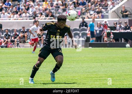 Los Angeles FC forward Kwadwo Opoku (22) heads the ball during a MLS match against the New York Red Bulls, Sunday, June 26, 2022, at the Banc of Calif Stock Photo