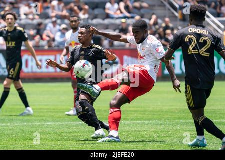 New York Red Bulls midfielder Dru Yearwood (16) sends a pass against Los Angeles FC forward Latif Blessing (7) during a MLS match, Sunday, June 26, 20 Stock Photo