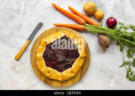 Step by step recipe of savory root vegetable galette. Step 7.  Stock Photo