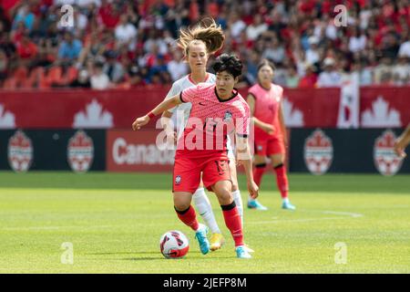 Jordyn Huitema #9 of Canada kick the ball before the International