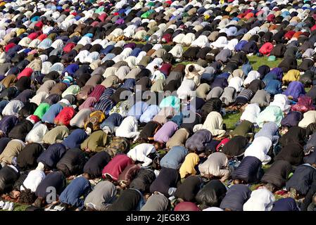 Muslims praying to celebrate the end of Ramadan. Turin, Italy - May 2022 Stock Photo