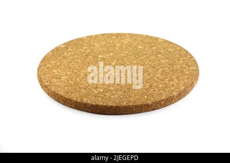 Empty round cork coaster, isolated on white background. Stock Photo