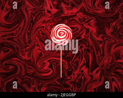 Red and white colored swirl round candy lollipop or lollypop on abstract red background. Stock Photo
