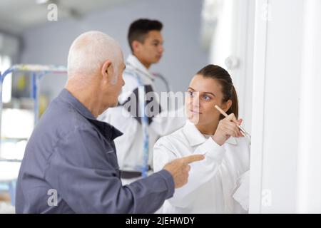 apprentices learning how to paint Stock Photo