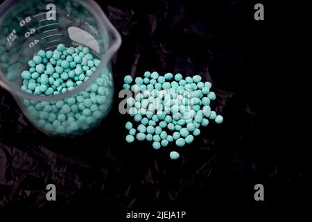 urea dangerous chemical and black background Stock Photo