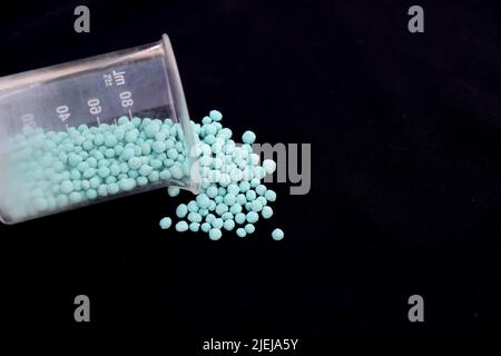 urea dangerous chemical and black background Stock Photo