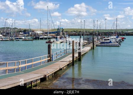 NEWHAVEN, EAST SUSSEX, UK - JUNE 26, 2022 : View of the marina in Newhaven on a summers day Stock Photo