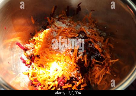 mix salad: rapped Beetroot, sliced carrot, salt, cabbage Stock Photo