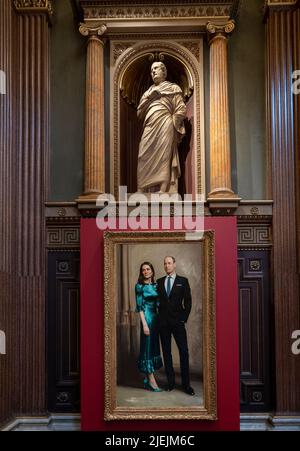 Portrait of Prince William and Catherine, Duchess of Cambridge by Jamie Coreth  in the Fitzwilliam Museum 26 June 2022 Portrait of the Duke and Duchess of Cambridge is the first official joint portrait of Prince William, Duke of Cambridge, and Catherine, Duchess of Cambridge, unveiled at the Fitzwilliam Museum on 23 June 2022 in the presence of the couple.Following an idea by Sir Michael Marshall, Jamie Coreth was commissioned in 2021 by the Cambridgeshire Royal Portrait Fund, which is held by the Cambridge Community Foundation, to paint a portrait of the Duke and Duchess as a gift to Cambridg Stock Photo