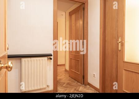 Distributor of a house with oak wood doors and matching parquet floors Stock Photo