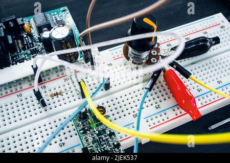Close-up of breadboard with electronic components Stock Photo