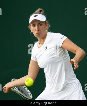 London, UK. . 27th June, 2022. Belgian Elise Mertens pictured in action during a first round game in the women's singles tournament between Belgian Mertens (WTA30) and Colombian Osorio (WTA61) at the 2022 Wimbledon grand slam tennis tournament at the All England Tennis Club, in south-west London, Britain, Monday 27 June 2022. BELGA PHOTO BENOIT DOPPAGNE Credit: Belga News Agency/Alamy Live News Stock Photo