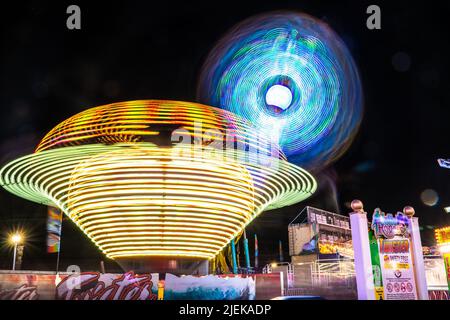 Ocean City, Maryland, USA - June 24, 2022:  View of Jolly Roger Amusement park seen from the Ocean City Maryland Boardwalk on a summer night with fun Stock Photo