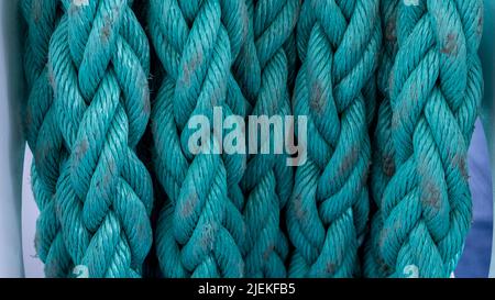 ship's rope texture. close up of a green thick rope. Stock Photo