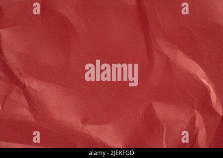 an empty wrinkled red pearl tissue paper textured background. text space for quotations Stock Photo