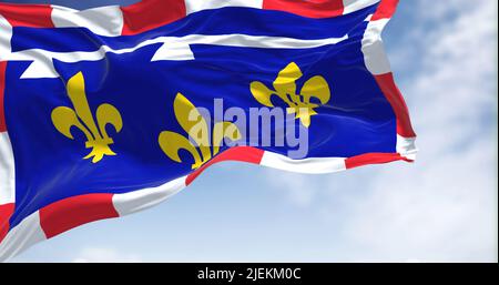 View of the Centre Val de Loire flag waving in the wind on a clear day. Centre-Val de Loire is one of the eighteen administrative regions of France. S Stock Photo