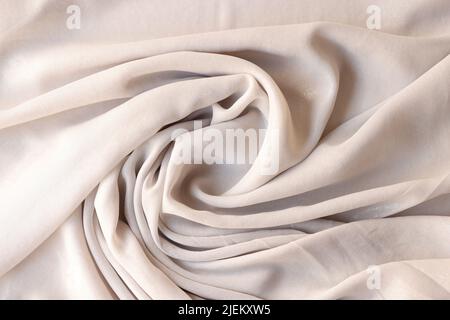 White creamy synthetic cotton fabric background. Texture fabric concept Stock Photo