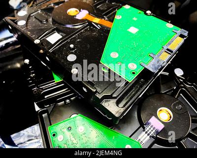 A pile of old hard drives Stock Photo