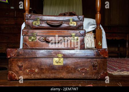 Leather suitcases - an interior view of Nunnington Hall in Yorkshire, a stately home owned by the National Trust Stock Photo