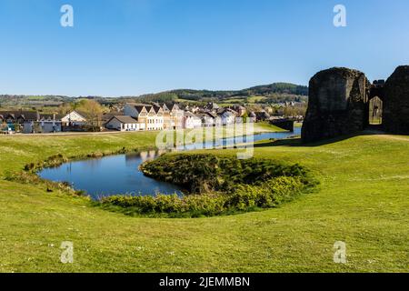 View to the town from 13th century castle with moat.  Caerphilly, Gwent, south Wales, UK, Britain Stock Photo