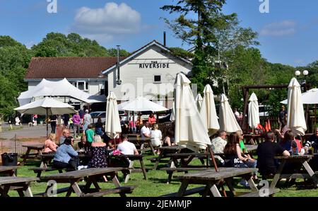 Some of outdoor seating area of The Riverside Inn and restaurant by River Avon, Saltford, UK Stock Photo