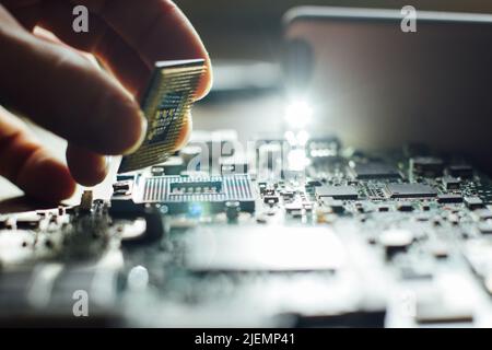 Installation of processor in CPU socket Stock Photo