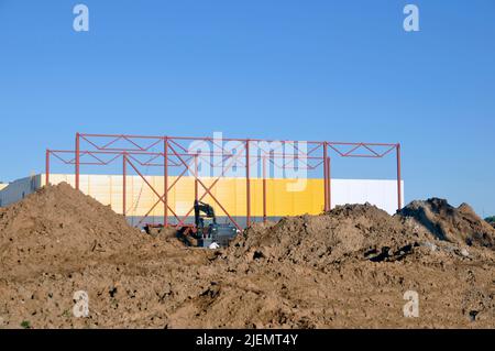 New construction warehouse warehouse logistics. Installation of metal structures. construction site. Stock Photo